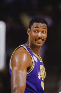 SALT LAKE CITY - 1989: Karl Malone #32 of the Utah Jazz smiles during an NBA game at The Salt Palace in Salt Lake City, Utah in 1989. (Photo by Rick Stewart/Getty Images)